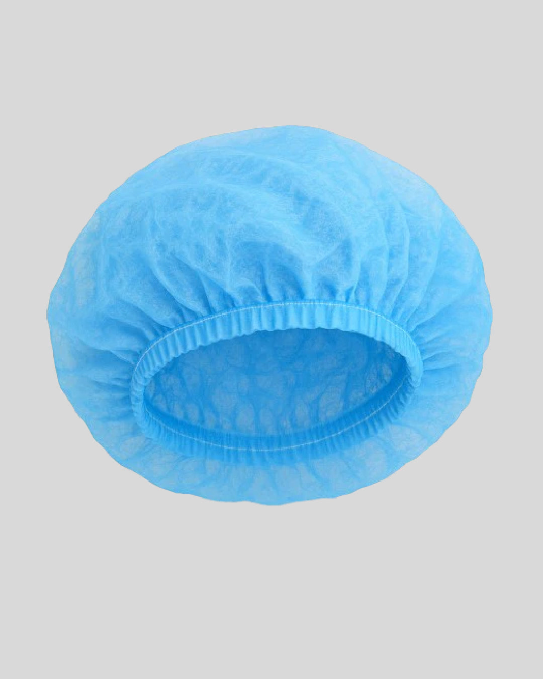 Disposable bouffant cap